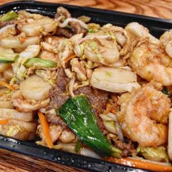 Mr Chen's - Jackson - a black plastic container filled with stir fried shrimp and vegetables - Chinese Near Me - Jackson, Mississippi