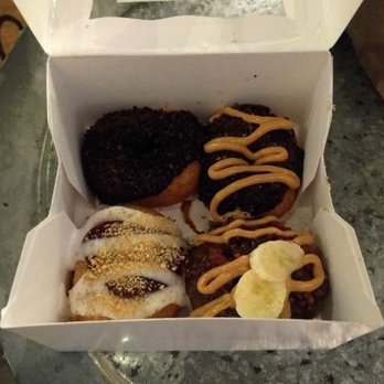 Simply Done Donuts - From top left: dark side, old dirty bird, strawberry cheesecake, and Elvis. - Food Trucks Near Me - Dunwoody, Georgia Simply Done Donuts - From top left: dark side, old dirty bird, strawberry cheesecake, and Elvis. - Food Trucks Near Me - Dunwoody, Georgia