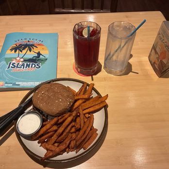 Islands Restaurant - Bleunami burger on wheat bread sans lettuce and red onion with sweet potato fries, ranch and the hibiscus agua Fresca. - American Near Me - Redondo Beach, California Islands Restaurant - Bleunami burger on wheat bread sans lettuce and red onion with sweet potato fries, ranch and the hibiscus agua Fresca. - American Near Me - Redondo Beach, California