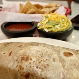 Giant Carnitas Burrito, guacamole, chips and salsa Giant Carnitas Burrito, guacamole, chips and salsa