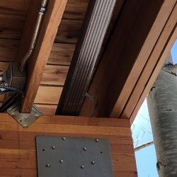 Rob Karbowski Seamless Gutter & Ice Melt Systems - It uploaded sideways, but you can see a broken bracket in clear site. Unacceptable work product.