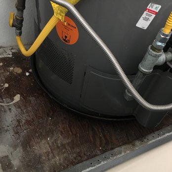 Water Heater Online - Drain pan underneath the tank - Water Heater Installation/Repair Near Me - San Diego, California Water Heater Online - Drain pan underneath the tank - Water Heater Installation/Repair Near Me - San Diego, California