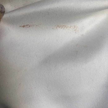 Young's Cleaners - Lipstick stain prior to cleaning - Laundry Services Near Me - Oakland, California