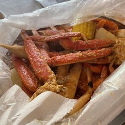 House mild Snow Crab Legs with Potatoes & corn 1/2 LB of shrimp