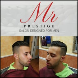 Mr. Prestige - Comb back undercut High #1 fade on the side and back. Skin tape up on the sides and back. #0.5 on the beard