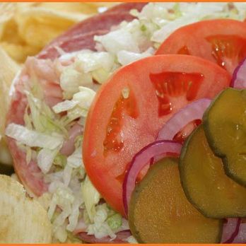 Shultz's Delicatessen - a sandwich with pickles and tomatoes - Delis Near Me - Hanover, Pennsylvania
