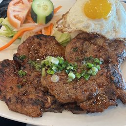 C5. Com Tam Thit Nuong - probably the most scrumptious grilled pork chops. I did add a yummy egg on top C5. Com Tam Thit Nuong - probably the most scrumptious grilled pork chops. I did add a yummy egg on top