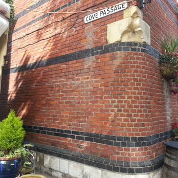 Red Lion - Cove Passage with engraved initials from D-Day soldiers - Pubs Near Me - Weymouth, DOR