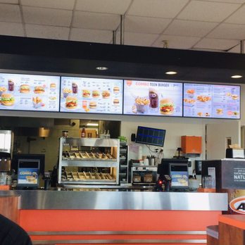 A&W - a restaurant with menus on the wall - Fast Food Near Me - Laval, Quebec