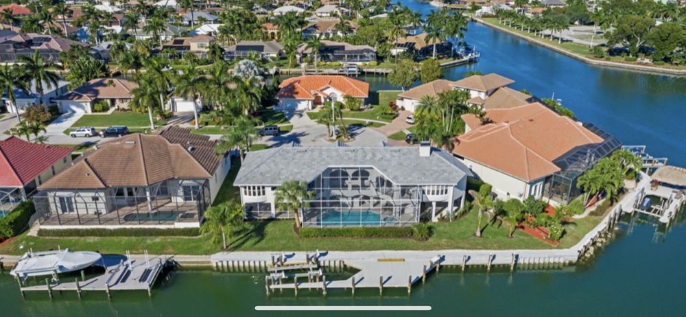 Slide of Naples Roofing