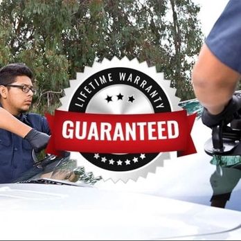 Maple Auto Glass - 2 People helping in windshield replacement. - Auto Glass Services Near Me - Peterborough, Ontario