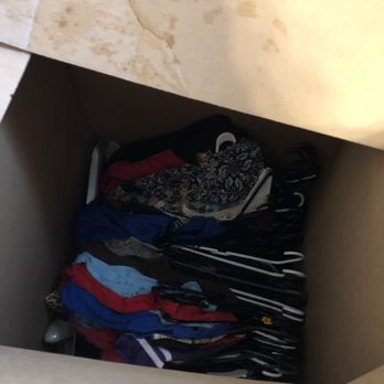 Spark Moving - Saturated wardrobe boxes (soaked and flipped upside down) - Movers Near Me - Schaumburg, Illinois