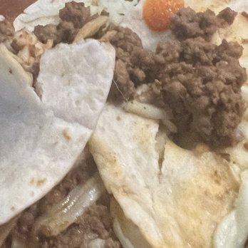 La Costilla Grill - Hair found in the tacos. It's a grey hair. - Mexican Near Me - McDonough, Georgia