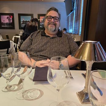 Mastro's Steakhouse - Wonderful Husband at our table. - Steakhouses Near Me - Palm Desert, California Mastro's Steakhouse - Wonderful Husband at our table. - Steakhouses Near Me - Palm Desert, California