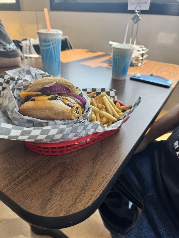 Colliding River Drive In Logo