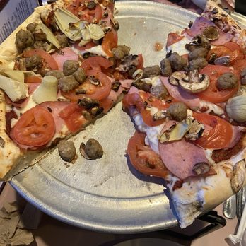 BC's Pizza & Beer - Half eaten Connoisseur pizza - Pizza Near Me - Clovis, California