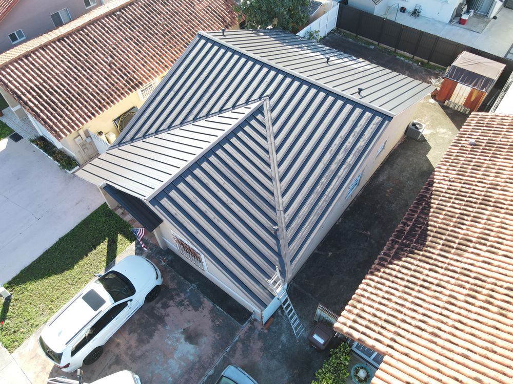 Slide of TJ Platinum Roofing