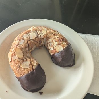 Cafe Elysa - Wheat free delicious almond horse shoe, marzipan dipped in chocolate very delicious - Coffee & Tea Near Me - Carlsbad, California