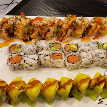 Mito Sushi & Grill - Top: Firecracker roll (the best one on the plate!) 2nd row: Alaskan roll 3rd row: spicy tuna crunch roll Bottom: Yummy Yummy roll - Japanese Near Me - Clermont, Florida Mito Sushi & Grill - Top: Firecracker roll (the best one on the plate!) 2nd row: Alaskan roll 3rd row: spicy tuna crunch roll Bottom: Yummy Yummy roll - Japanese Near Me - Clermont, Florida