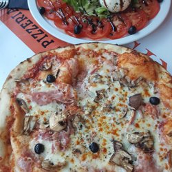 Carissimi Pizzas - First time having pizza in France and it was fantastic! Definitely recommended. Merci beaucoup!