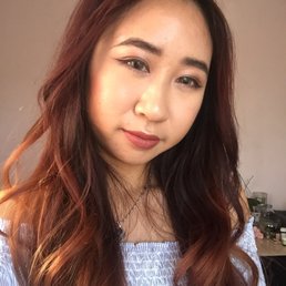 The color I had prior to bleaching and dying at this salon (faded from burgundy box dye R48?).