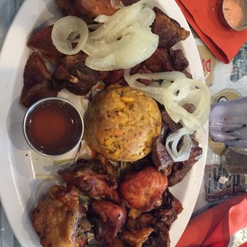 Isla Del Encanto - Food was good and for the price. Great taste fresh made... Mofongo with steak, chicken and pork chunks yummm - Puerto Rican Near Me - Miami, Florida Isla Del Encanto - Food was good and for the price. Great taste fresh made... Mofongo with steak, chicken and pork chunks yummm - Puerto Rican Near Me - Miami, Florida