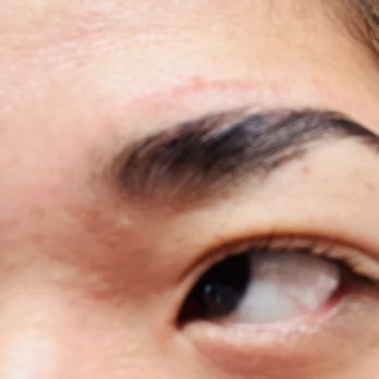 Destination Beauty 21 - You obviously can see a hug redness and line  of abrasions on top of my brows after laminating. I am in pain from yesterday to now - Eyelash Service Near Me - Riverside, California