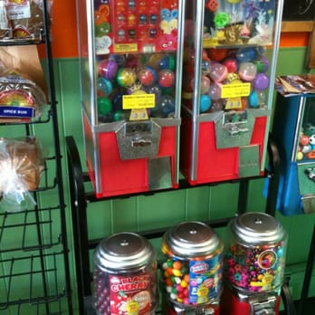 Eddy's Jerk Center - a row of candy machines - Caribbean Near Me - Newburgh, New York Eddy's Jerk Center - a row of candy machines - Caribbean Near Me - Newburgh, New York