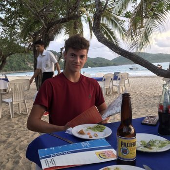 La Perla - Son enjoying his guacamole - Seafood Near Me - Zihuatanejo, GRO La Perla - Son enjoying his guacamole - Seafood Near Me - Zihuatanejo, GRO