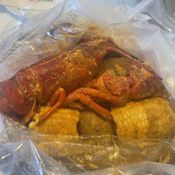 Ben's Crab Uniondale - B. 1 1/2 lb. Lobster and 1 lb. Shrimp Head Off Combo with Ben's Special Cajun Sauce - Seafood Near Me - Uniondale, New York Ben's Crab Uniondale - B. 1 1/2 lb. Lobster and 1 lb. Shrimp Head Off Combo with Ben's Special Cajun Sauce - Seafood Near Me - Uniondale, New York