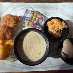 Hush puppies, she crab soup, pimento cheese, shrimp & grits. The plate looks small but this was very very filling.
