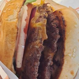 Super duper burger with everything add bacon and cheese Super duper burger with everything add bacon and cheese