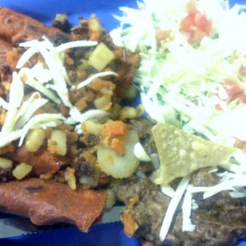 La Fe Cafe - Potosinas with housemade refried beans and a fresh cabbage salad with lime - Yum! - Mexican Near Me - Kenosha, Wisconsin La Fe Cafe - Potosinas with housemade refried beans and a fresh cabbage salad with lime - Yum! - Mexican Near Me - Kenosha, Wisconsin