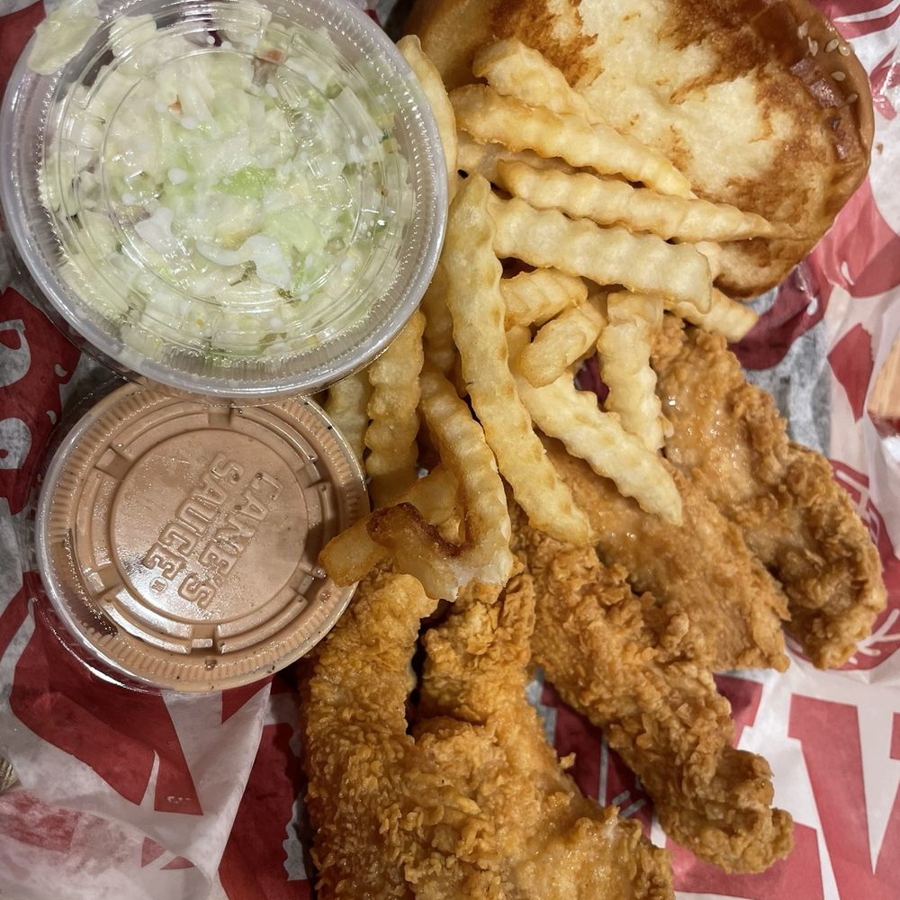 Raising Cane's Chicken Fingers - Tenders, slaw, toast, canes sauce. The works! - Fast Food Near Me - Columbia, Maryland Raising Cane's Chicken Fingers - Tenders, slaw, toast, canes sauce. The works! - Fast Food Near Me - Columbia, Maryland