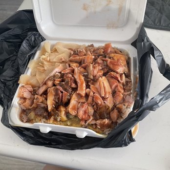 Island Krave - Small Jerk Smoked Chicken Plate with yellow goo on top of rice under the chicken - Caribbean Near Me - Norfolk, Virginia Island Krave - Small Jerk Smoked Chicken Plate with yellow goo on top of rice under the chicken - Caribbean Near Me - Norfolk, Virginia