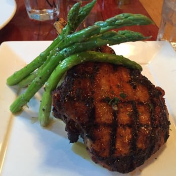 The Place - Pork chop with apricot glaze, smashed potatoes and grilled asparagus - Southern Near Me - Athens, Georgia The Place - Pork chop with apricot glaze, smashed potatoes and grilled asparagus - Southern Near Me - Athens, Georgia