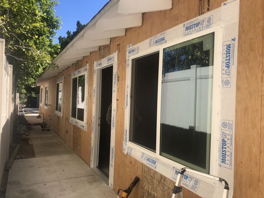 Windows Installation - This Remodel Was on an Old Garage Big Garage We Converted On 3 Rooms And Two Bathroom ADU, 90% Of the Garage was demolish, This is the progress Of Windows Installation And Shear Walls, Ready Stucco Windows Installation - This Remodel Was on an Old Garage Big Garage We Converted On 3 Rooms And Two Bathroom ADU, 90% Of the Garage was demolish, This is the progress Of Windows Installation And Shear Walls, Ready Stucco