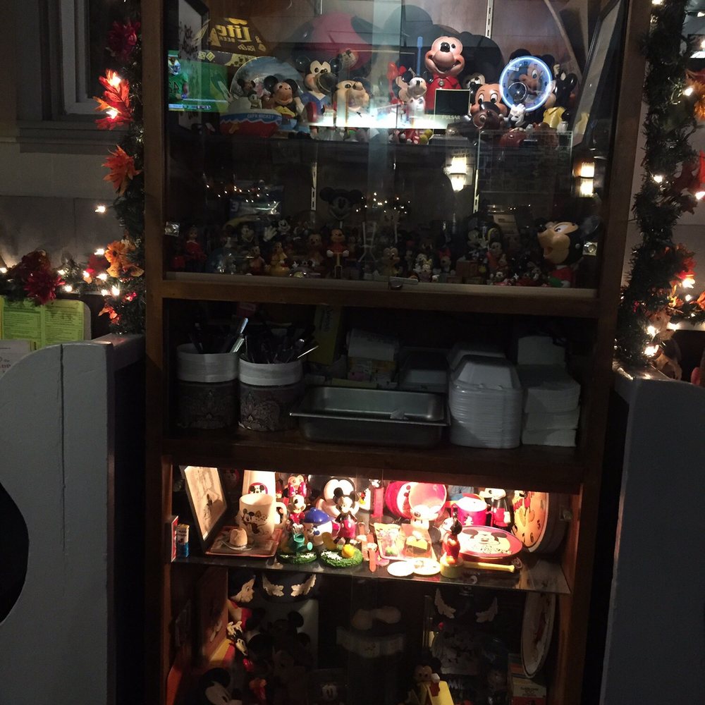 Mouse Tavern & Restaurant - a display of mickey mouse figurines - American Near Me - Beloit, Wisconsin