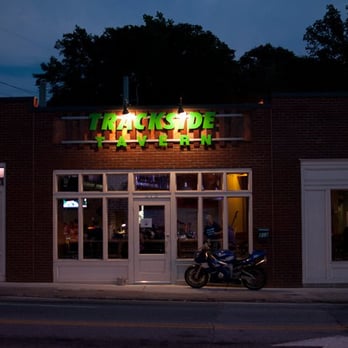 Trackside Tavern - a motorcycle parked in front of the restaurant - Dive Bars Near Me - Decatur, Georgia Trackside Tavern - a motorcycle parked in front of the restaurant - Dive Bars Near Me - Decatur, Georgia
