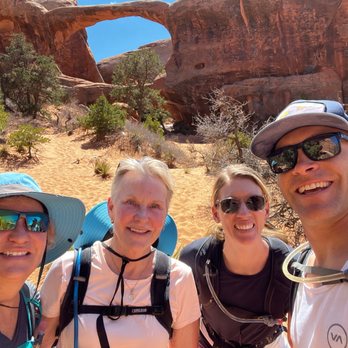 Arches National Park - 4 hours into the hike, beautiful arch under a blue sky - Parks Near Me Arches National Park - 4 hours into the hike, beautiful arch under a blue sky - Parks Near Me
