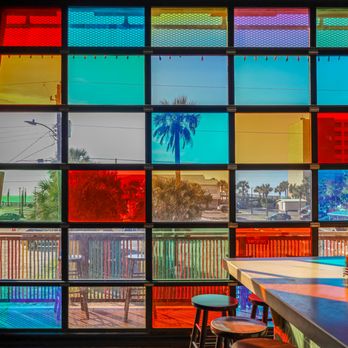 Taco Boy - The mosaic garage doors instantly transform the Octo Bar into an indoor/outdoor oasis - Mexican Near Me - Folly Beach, South Carolina Taco Boy - The mosaic garage doors instantly transform the Octo Bar into an indoor/outdoor oasis - Mexican Near Me - Folly Beach, South Carolina