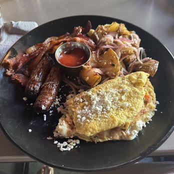 Wild Rose Eatery and Bar - Omelette with goat cheese, country potatoes, sausage and bacon - Cocktail Bars Near Me - Campbell, California Wild Rose Eatery and Bar - Omelette with goat cheese, country potatoes, sausage and bacon - Cocktail Bars Near Me - Campbell, California