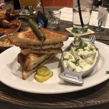 The Rustic - Hot Chicken Sandwich with potato salad - Bars Near Me - Houston, Texas The Rustic - Hot Chicken Sandwich with potato salad - Bars Near Me - Houston, Texas