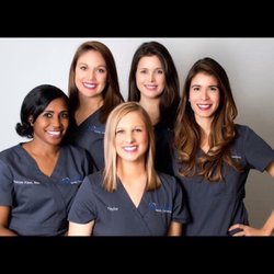 Milestone Family Dentistry - The staff, Dr Perdomo is the 2nd from the right in the back row. Great folks!