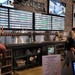 Sonder Brewing Taproom & Beer Garden - Sunder Brewing tap wall.