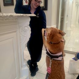 Remy Martine saying goodbye to her new friend at K9.