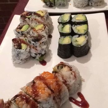 Sake Sushi - eel and avocado roll, avocado roll, and shrimp tempura roll on the bottom plate; top plate is dragon roll and california rolls - Sushi Bars Near Me - Brooklyn, New York Sake Sushi - eel and avocado roll, avocado roll, and shrimp tempura roll on the bottom plate; top plate is dragon roll and california rolls - Sushi Bars Near Me - Brooklyn, New York