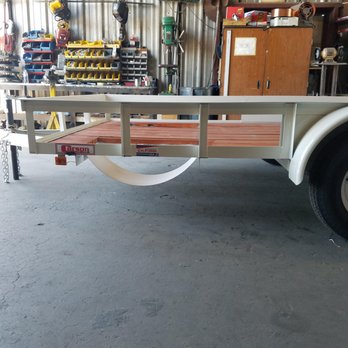 Trailer Depot - Customer wanted his ATV to fit in the garage so we modified the trailer so both trailer and ATV could fit in the customers garage together. - RV Dealers Near Me - Las Vegas, Nevada Trailer Depot - Customer wanted his ATV to fit in the garage so we modified the trailer so both trailer and ATV could fit in the customers garage together. - RV Dealers Near Me - Las Vegas, Nevada