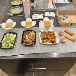 General Tso's Chicken, Shrimp & Vegetables, Mongolian Beef and egg rolls.