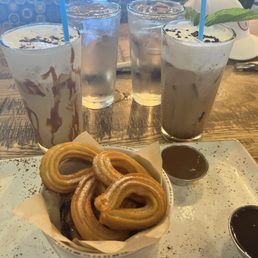 Churros, served with caramel & chocolate sauce for dipping